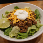 Delicious taco salad featuring 3-ingredient ground beef, perfect for a quick meal.