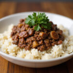 3 ingredient ground beef served over rice, easy and delicious.