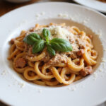 Delicious ground turkey pasta served with basil and Parmesan cheese.