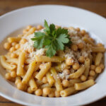 Perfect chickpea pasta dish with parsley and Parmesan, healthy eating.