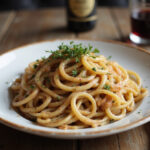 Delicious French Onion Pasta with fresh thyme and red wine.
