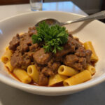 Finished Instant Pot ground beef and pasta dish ready to eat.