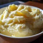 Close-up of a bowl of creamy mashed potatoes, a simple and delicious potato recipe.
