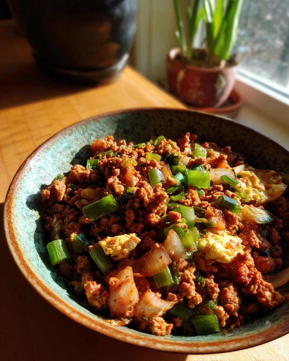 Bowl of cooked ground turkey with onions and green peppers, a tasty ground turkey recipes example.