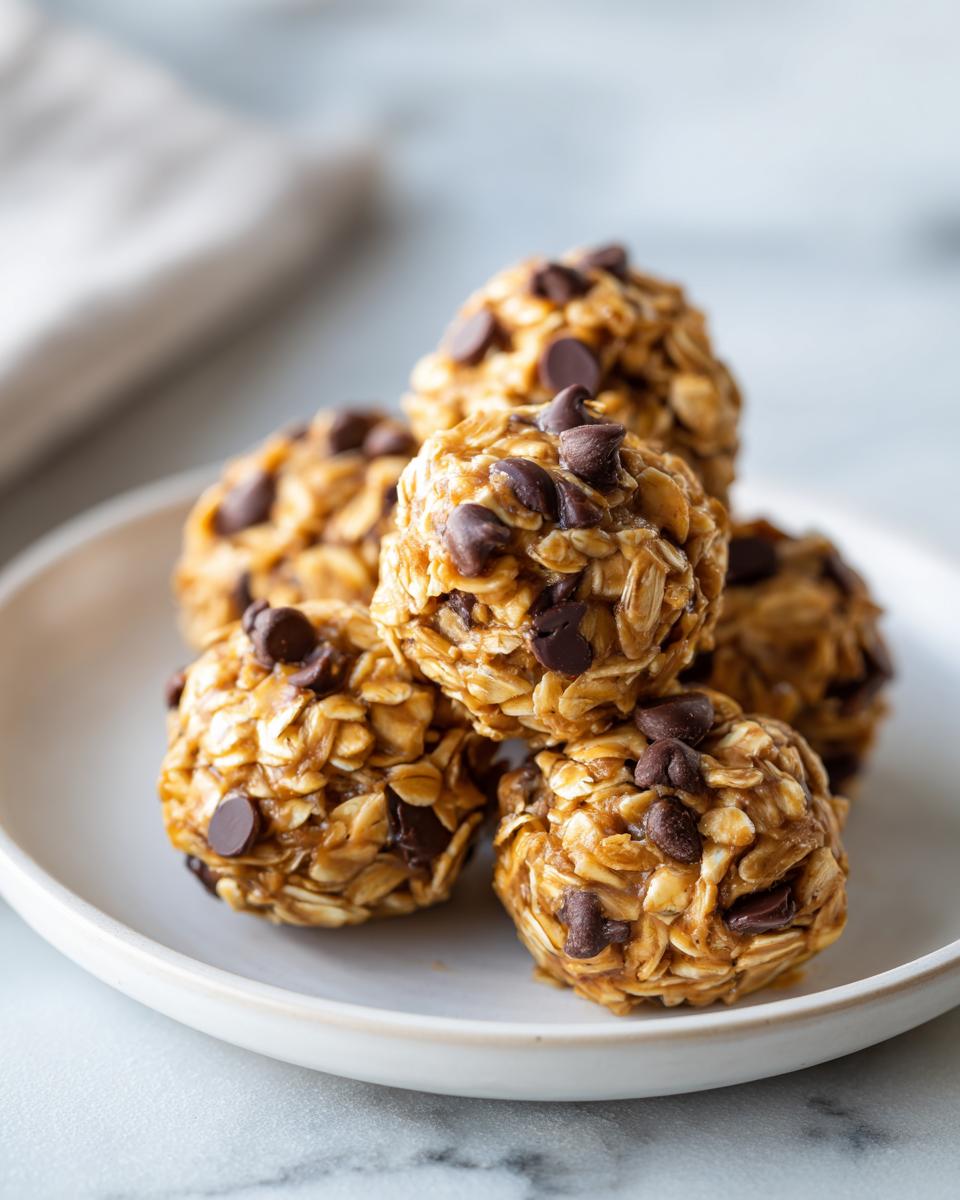 Plate of chocolate chip oat energy bites, a kid friendly sweet snacks option.