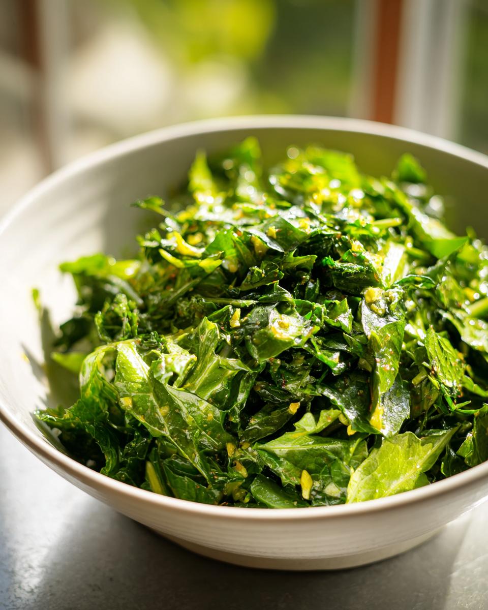 Bowl filled with vibrant green fresh herbs, perfect for spring fresh herb recipes.
